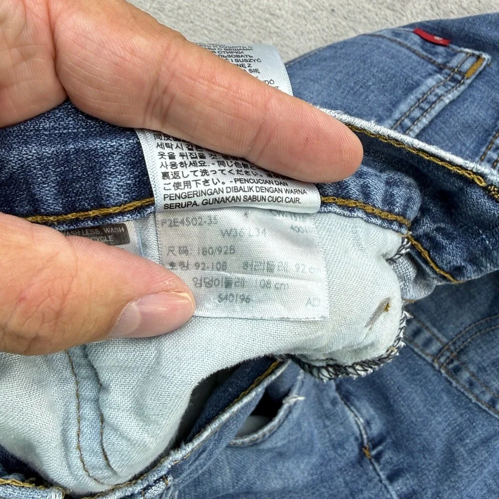 Levi's 502 Regular Taper Jeans Mens 36x34 Blue Denim Medium Wash Straight Casual